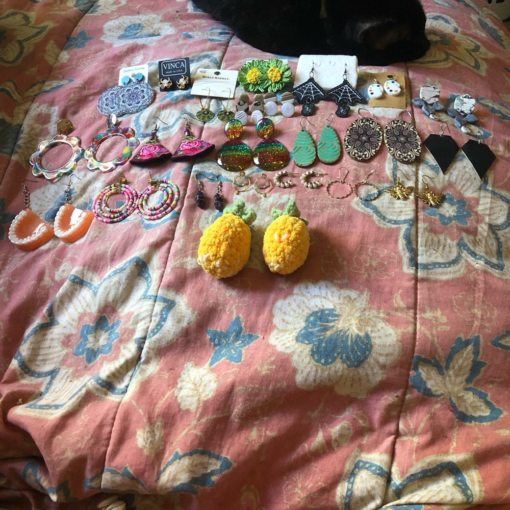 26 earrings different types in different colors perfect for any occasion.